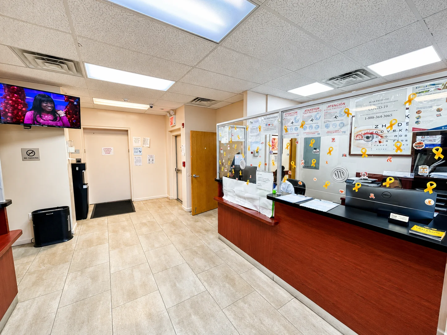 Be Well Primary Health Care Center reception desk and patient check-in area